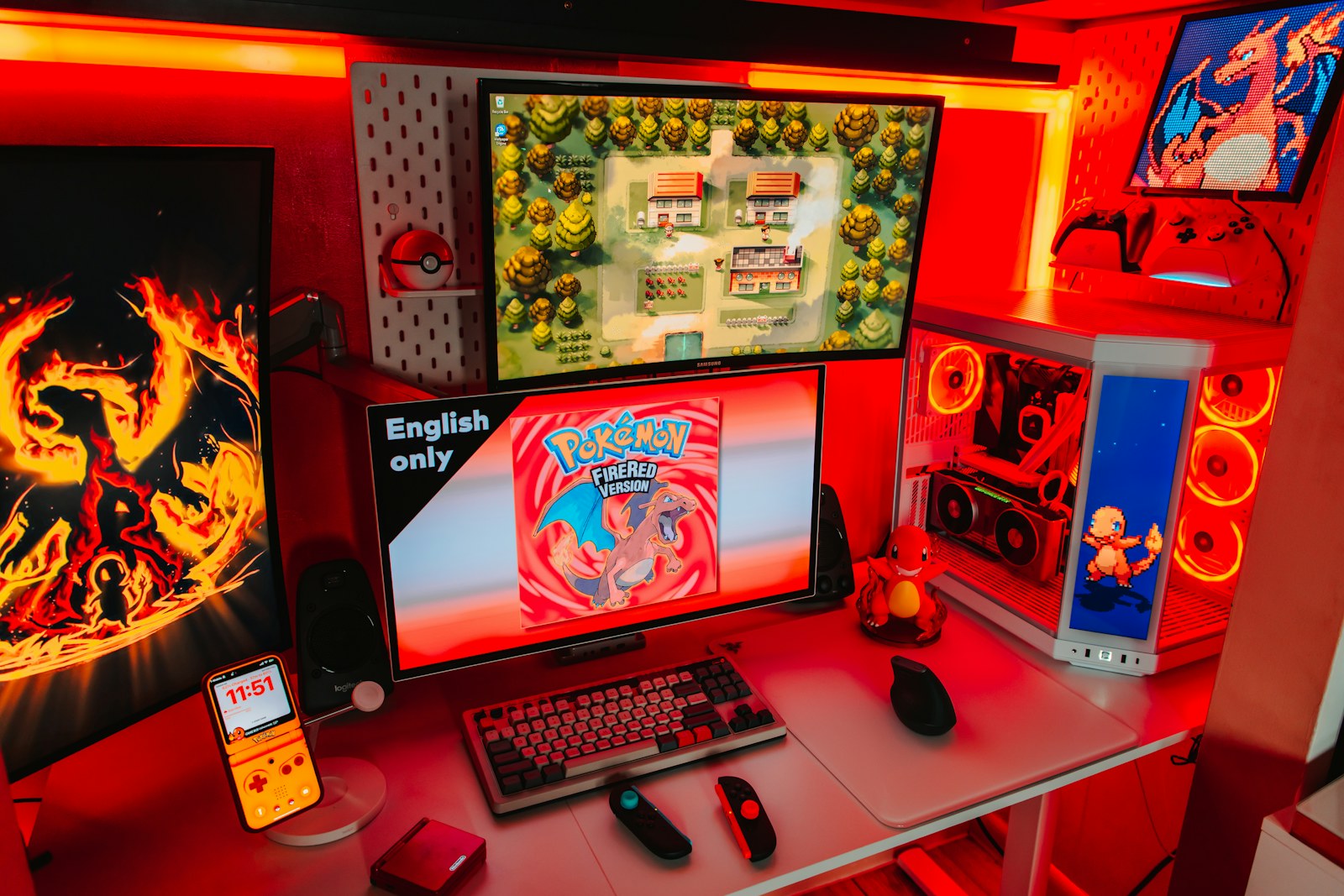 A red gaming setup with multiple screens